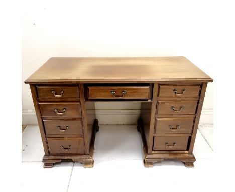 Solid oak pedestall deak on bracket feet - some fading to the top - 122cm x 57cm x 76cm