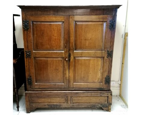 Antique elm 2 door hall cupboard with hanging rail and 2 false drawers to the base terminating on bracket feet - 145cm x 52cm