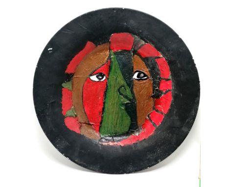 Mid century hand painted charger initials J.P and iii to reverse 46cm diameter - some losses to the black paint otherwise in 