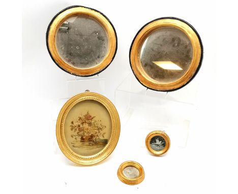 4 gilt framed circular mirrors (2 with bird detail - 10cm diameter) t/w antique needlework still life in an oval frame (old r