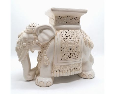 Oriental pottery elephant garden seat / plant stand with pierced detail - 46cm high x 50cm wide x 22cm across. No obvious dam