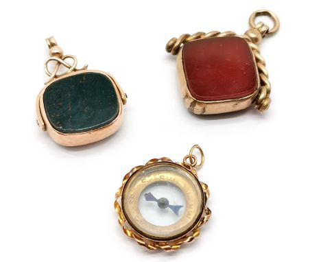 2 x 9ct gold fobs (compass &amp; cornelian / bloodstone swivel (Chester hallmark)) - total weight 7.7g t/w a larger 9ct gold 