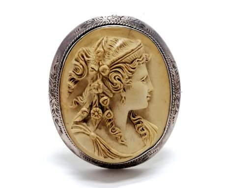 Antique hand carved lava cameo portrait brooch in unmarked silver mount - 5cm
