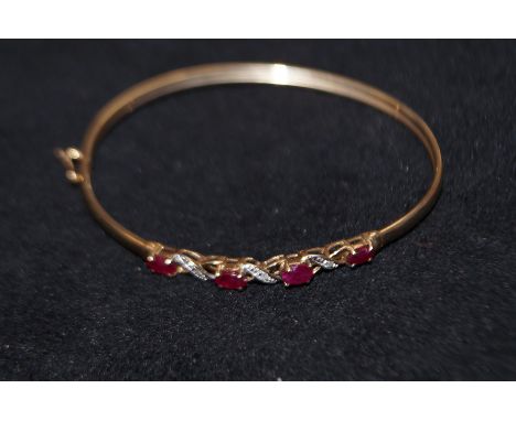 9ct gold ruby and diamond bangle 4.3 grams