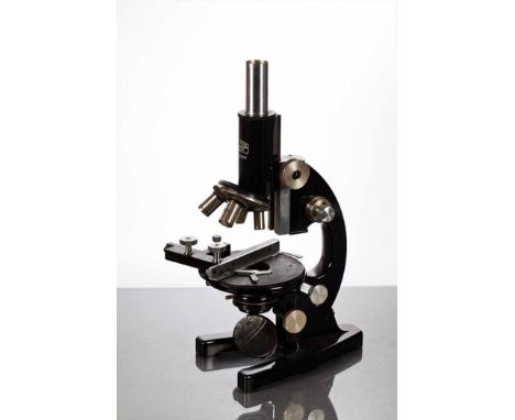 CARL ZEISS JENA MICROSCOPE
in black enamel, serial number 231619, approximately 36cm high, in a mahogany case with keys CONDI