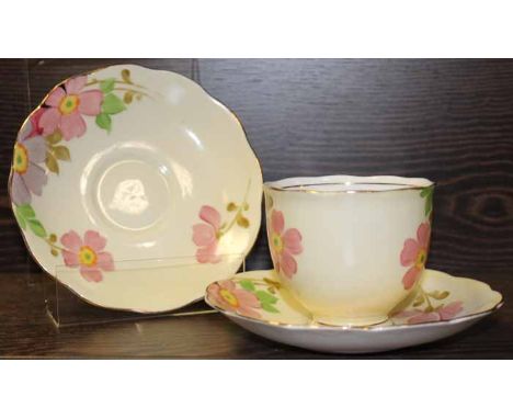 ROSLYN CHINA HAND PAINTED TEA SERVICE
decorated with flowers, with eleven place settings, sugar and cream