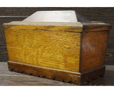 OAK AND MAHOGANY SARCOPHAGUS TEA CADDY
with two internal compartments, evidence of foil lining
Note: Good condition
