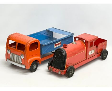 Two large vintage Tri-ang tinplate toys. A Tri-ang Express locomotive. A Tri-ang Tip Truck. 51cm. 48cm