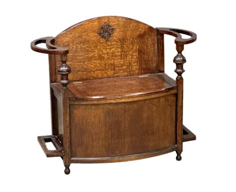 An Early 20th Century oak combination hall bench/umbrella stand. Circa 1920-1930. 93x40x79cm. (6)