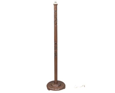 A vintage Chinese carved teak standard lamp. 188cm. 1