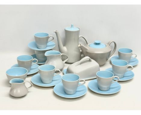 A Mid Century “Twintone” tea and coffee service by Poole Pottery.