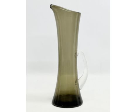 A tall 1960’s Whitefriars smoked glass pitcher. 37cm