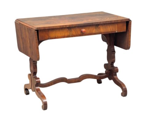 A Mid 19th Century North European mahogany sofa table with quarter cut veneer top and stretcher support base. Circa 1860. Ext