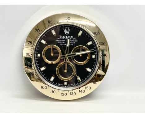 A Rolex Oyster Perpetual Superlative Chronometer Officially Certified Cosmograph adverting wall clock. 34cm