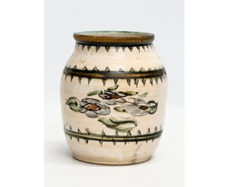 An Early 20th Century glazed ceramic pot. 14x17cm