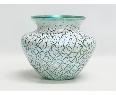 A large Bohemian style iridescent glass bowl. In the manner of Loetz. 23x19cm