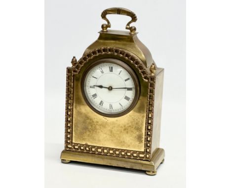 A Late 19th Century French brass mantle clock. 16x25cm