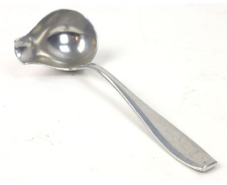 A Nazi gravy ladle stamped with an eagle emblem to the handle 