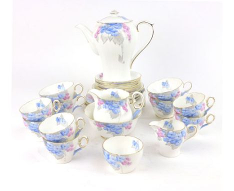 A Shelley part tea and coffee service, the white ground decorated with blue and pink floral sprays CONDITION REPORT: Coffee p