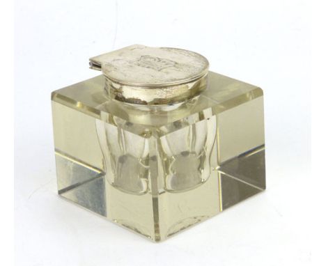 An early 20th century glass and silver topped inkwell with square outline and engraved top, indistinct marks