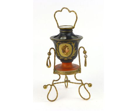 A Napoleon III porcelain inkwell, the background decorated with a head and shoulders portrait of a young woman, on a gilt met