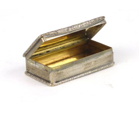 A 19th century silver rectangular engine turned snuff box with a hinged top lid, Birmingham, indistinct date mark