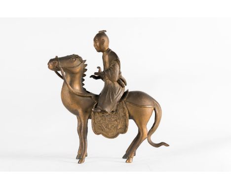  A bronze sculpture of a riding monk  China, 19th century . Cm 22,50 x 25,50. 