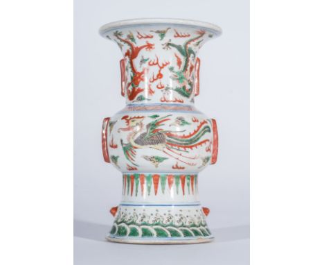  A rare Zun shaped wucai porcelain vase bearing a Jiajing six character underglaze mark within double circle painted at the b