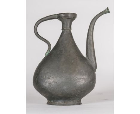  A Persian bronze ewer  . Cm 28,00. 