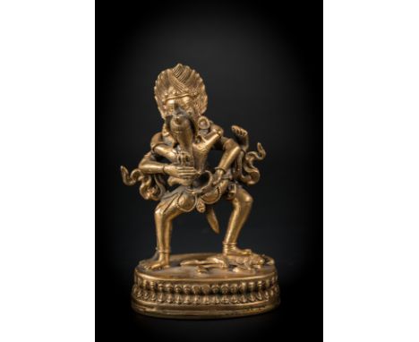 A gilt bronze figure of Red Mahakala in yab yum  Nepal, 20th century . Cm 9,50 x 15,50. 