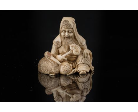  An ivory netsuke depicting a scholar and a swan. Signed at the base.  Japan, 19th century. Cm 5,00 x 5,00. 