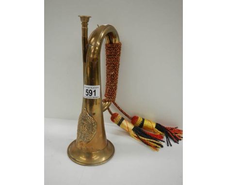 A mid to late 20th century brass bugle.