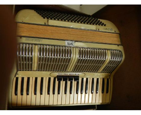 An L Busk Acchio accordion in very good condition and working order.