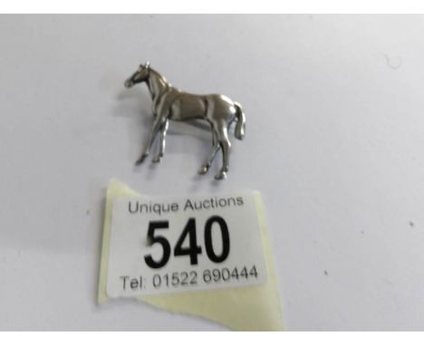A silver brooch of the Irish bred racehorse 'Pappa Fourway', inscribed with owners name Mrs Elaind Godson on reverse (See Wik