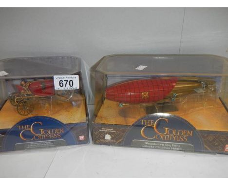 2 boxed Golden Compass models being Magisterium Carriage and Magisterium sky ferry.