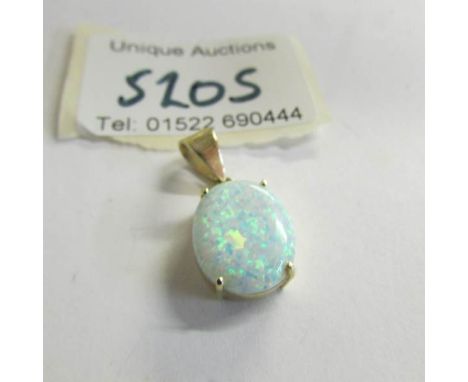 A 14ct yellow gold and opal pendant.