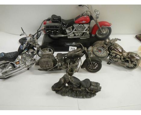 4 good model motor cycles including Harley Davidson.