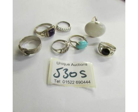 7 assorted silver rings,