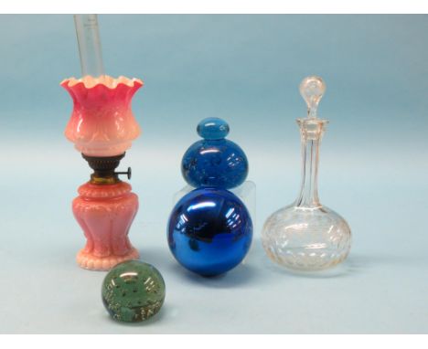 A late Victorian pressed, coloured glass oil lamp, with shade, engraved glass decanter, with stopper, two coloured glass pape