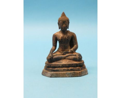 A bronze seated Buddha, dark patination, on lotus base, 7.5in. 