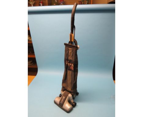 A vintage Hoover Junior suction sweeper, with instructions and boxed attachment, near-excellent