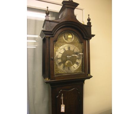 A George III 8-day longcase clock by Woodley, Kington, arched brass dial with Old Father Time, engraved dial centre with subs