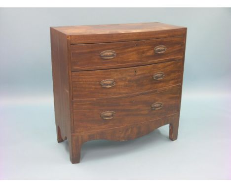 A mid-19th century bow-fronted chest, three long drawers, replacement pressed copper handles, splay bracket feet, 2ft. 11in.