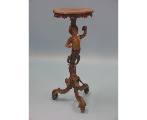 A late 19th century Italian carved pine occasional table, figural stem on tripod base with carved detail, top 1ft. 