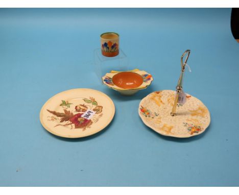 Clarice Cliff, soup bowl and pickle dish in Crocus pattern, latter cover lacking, together with a Celtic Harvest cake plate a