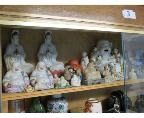 Oriental ceramic ornaments, including a pair of seated females 