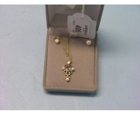 A 9ct. gold, amethyst and seed-pearl pendant, on fine-link 9ct. gold chain and a pair of seed-pearl ear-rings,  one ear-ring 