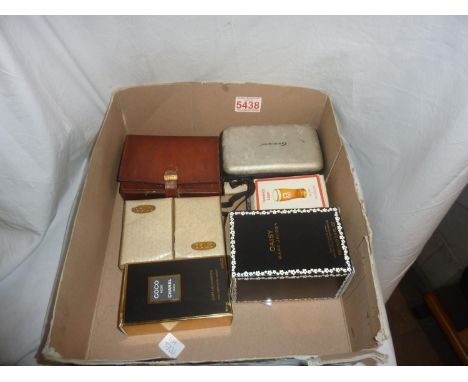 Mixed items including playing cards, Nintendo DS lite and two bottles of perfume, perfumes are full. Not available for in-hou