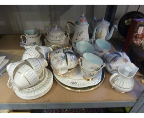 Large quantity of vintage tea services, including Ridgway, Queen Anne and Windsor with a pair of Flintlock cabinet plates. No