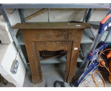 Cast iron fire surround with hearth and grate. Not available for in-house P&amp;P 